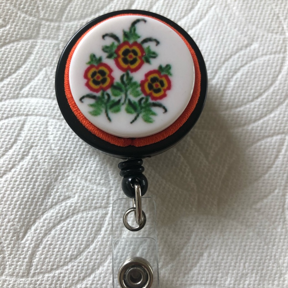 Pansy badge reel